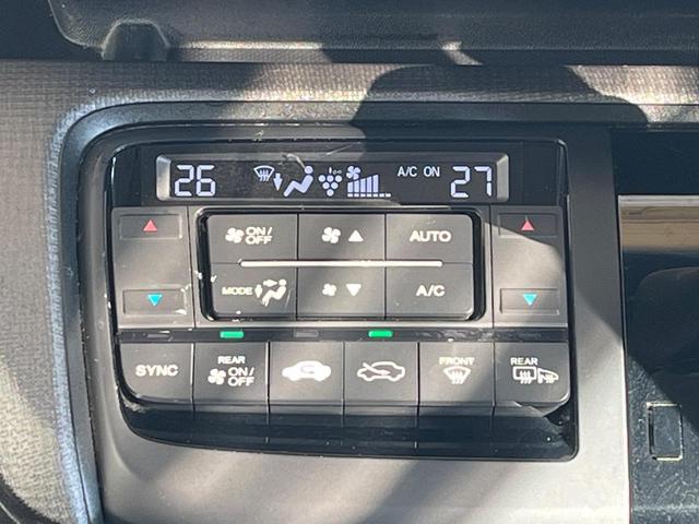 ステップワゴンスパーダ スパーダ 両側電動ドア 後席モニター バックカメラ 禁煙車 スマートキー LEDヘッド ビルトインETC クルコン 純正16インチアルミ オートライト デュアルエアコン Bluetooth CD DVD再生(25枚目)