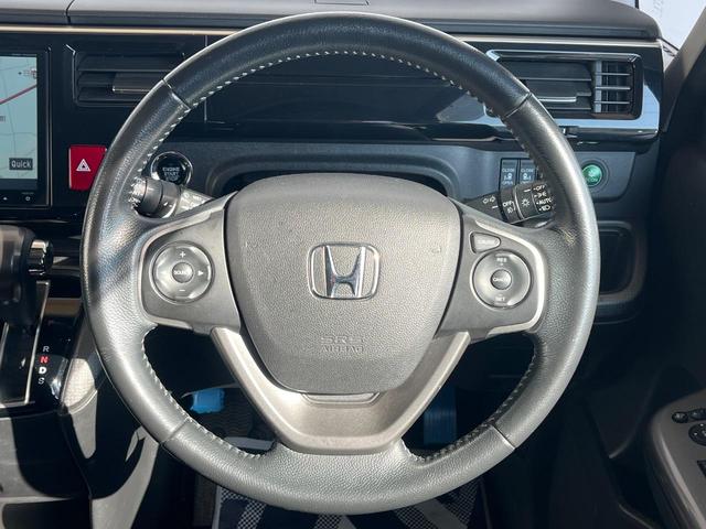 ステップワゴンスパーダ スパーダ 両側電動ドア 後席モニター バックカメラ 禁煙車 スマートキー LEDヘッド ビルトインETC クルコン 純正16インチアルミ オートライト デュアルエアコン Bluetooth CD DVD再生(27枚目)