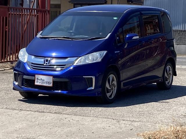 フリードハイブリッド ジャストセレクション Sキー ETC ナビ Bluetooth Bカメラ 両Pスラ 盗難防止システム 衝突安全ボディ キーレスエントリー 運転席エアバッグ 助手席エアバッグ(5枚目)