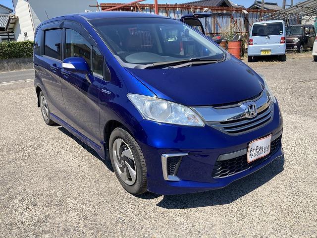 フリードハイブリッド ジャストセレクション Sキー ETC ナビ Bluetooth Bカメラ 両Pスラ 盗難防止システム 衝突安全ボディ キーレスエントリー 運転席エアバッグ 助手席エアバッグ(7枚目)