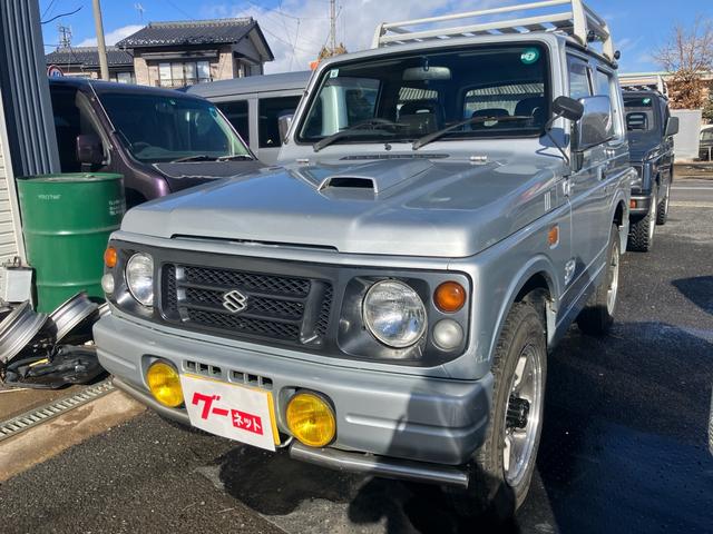 ジムニー インタークーラーターボ 4WD 5速マニュアル ABS エアコン CDオーディオ ルーフキャリア リアースポイラー 夏タイヤ新品(2枚目)