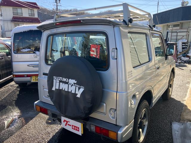 ジムニー インタークーラーターボ 4WD 5速マニュアル ABS エアコン CDオーディオ ルーフキャリア リアースポイラー 夏タイヤ新品(12枚目)