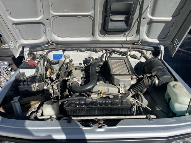 ジムニー インタークーラーターボ 4WD 5速マニュアル ABS エアコン CDオーディオ ルーフキャリア リアースポイラー 夏タイヤ新品(41枚目)