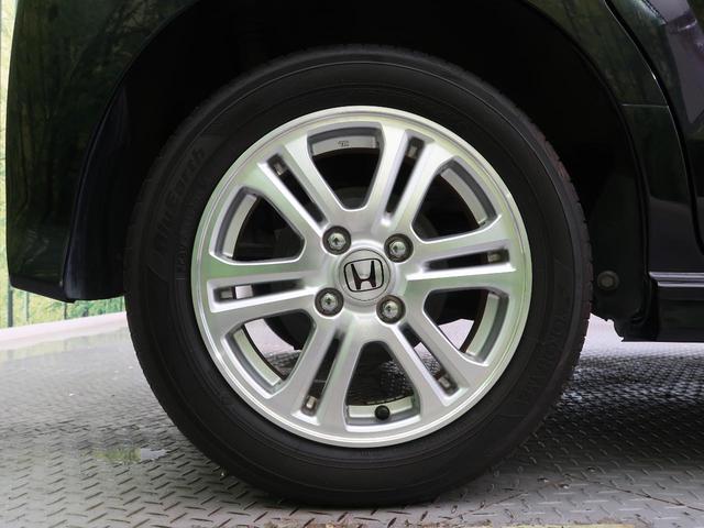 G・Lパッケージ 社外SDナビ 禁煙車 両側電動スライド HIDヘッド ハロゲンフォグ スマートキー 純正14インチAW オートエアコン ベンチシート DVD再生 フルセグTV 横滑り防止装置 盗難防止装置(4枚目)
