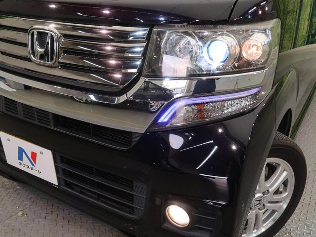 G・Lパッケージ 社外SDナビ 禁煙車 両側電動スライド HIDヘッド ハロゲンフォグ スマートキー 純正14インチAW オートエアコン ベンチシート DVD再生 フルセグTV 横滑り防止装置 盗難防止装置(34枚目)