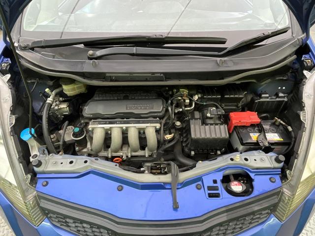 フィット Gスマートセレクション 4WD 楽ナビ バックカメラ 寒冷地仕様 禁煙車 スマートキー HIDヘッド ビルトインETC オートライト CD/DVD再生 シートリフター 電動格納ミラー 15インチAW プライバシーガラス(18枚目)