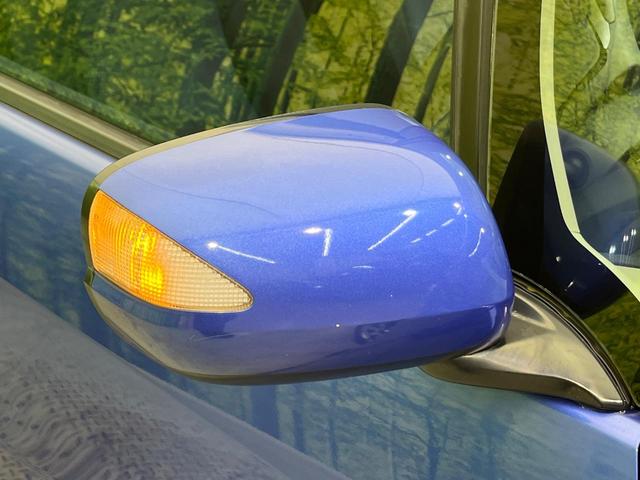 フィット Gスマートセレクション 4WD 楽ナビ バックカメラ 寒冷地仕様 禁煙車 スマートキー HIDヘッド ビルトインETC オートライト CD/DVD再生 シートリフター 電動格納ミラー 15インチAW プライバシーガラス(31枚目)