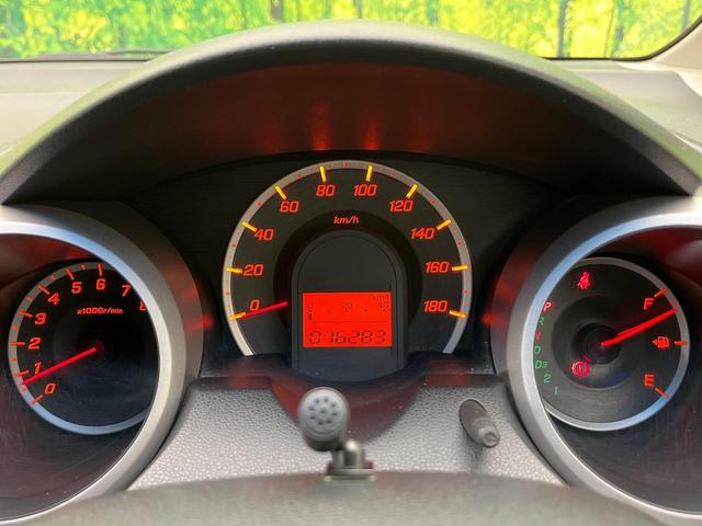 フィット Gスマートセレクション 4WD 楽ナビ バックカメラ 寒冷地仕様 禁煙車 スマートキー HIDヘッド ビルトインETC オートライト CD/DVD再生 シートリフター 電動格納ミラー 15インチAW プライバシーガラス(46枚目)