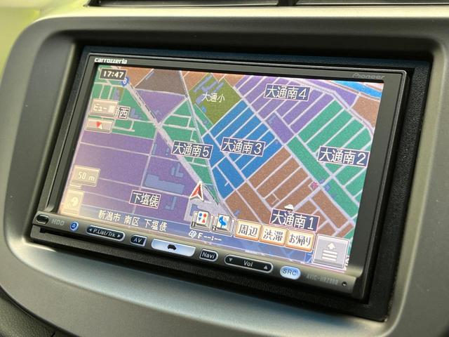 フィット Gスマートセレクション 4WD 楽ナビ バックカメラ 寒冷地仕様 禁煙車 スマートキー HIDヘッド ビルトインETC オートライト CD/DVD再生 シートリフター 電動格納ミラー 15インチAW プライバシーガラス(47枚目)
