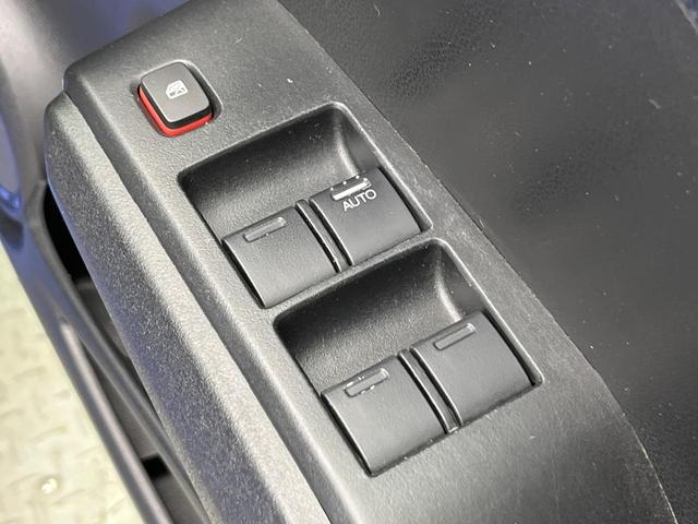 フィット Gスマートセレクション 4WD 楽ナビ バックカメラ 寒冷地仕様 禁煙車 スマートキー HIDヘッド ビルトインETC オートライト CD/DVD再生 シートリフター 電動格納ミラー 15インチAW プライバシーガラス(57枚目)
