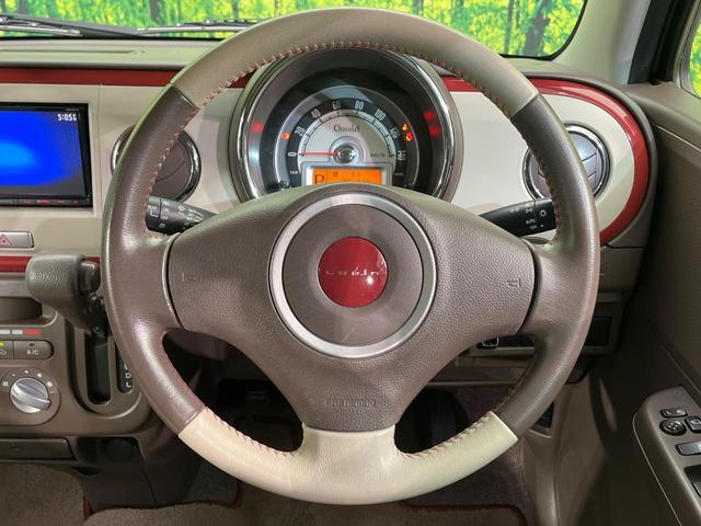 アルトラパンショコラ G SDナビ バックカメラ 禁煙車 レザーシート スマートキー HIDヘッド オートライト 純正14インチAW CD/DVD再生 電動格納ミラー 合皮シート プライバシーガラス アイドリングストップ(11枚目)