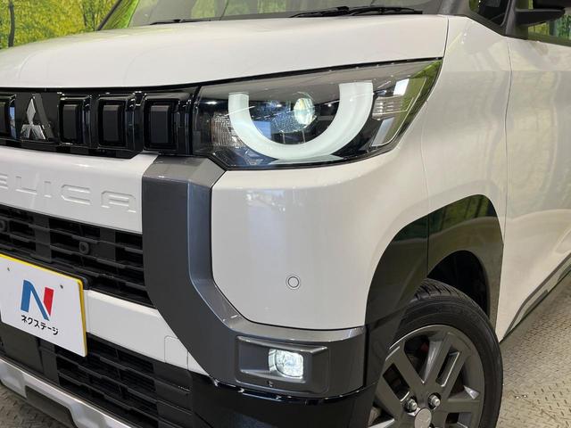 デリカミニ T プレミアム 4WD ターボ 両側電動スライド 9型ナビ 全周囲カメラ イーアシスト マイパイロット 禁煙車 シートヒーター スマートキー LEDヘッド ルーフレール 純正15インチAW ステアリングヒーター(12枚目)