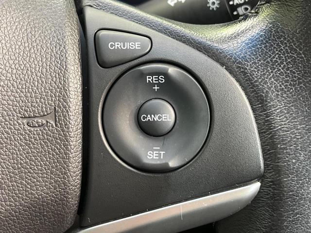 フィットハイブリッド Ｌパッケージ　純正ナビ　バックカメラ　寒冷地仕様　衝突被害軽減システム　禁煙車　ハーフレザーシート　スマートキー　ＬＥＤヘッド　ＥＴＣ　クルコン　オートライト　オートエアコン　Ｂｌｕｅｔｏｏｔｈ　電動格納ミラー（7枚目）