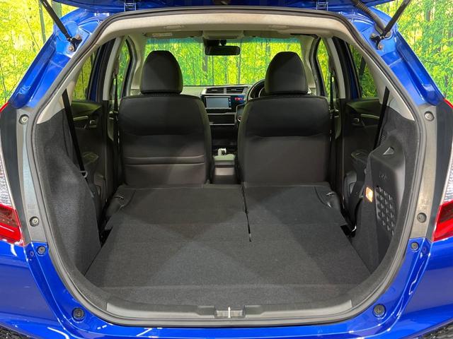 フィットハイブリッド Ｌパッケージ　純正ナビ　バックカメラ　寒冷地仕様　衝突被害軽減システム　禁煙車　ハーフレザーシート　スマートキー　ＬＥＤヘッド　ＥＴＣ　クルコン　オートライト　オートエアコン　Ｂｌｕｅｔｏｏｔｈ　電動格納ミラー（11枚目）