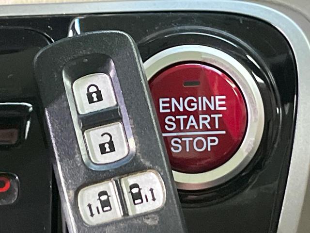 Ｎ－ＢＯＸ Ｇ・ターボＬパッケージ　４ＷＤ　ターボ　両側電動ドア　禁煙車　スマートキー　ＥＴＣ　クルコン　オートエアコン　ＣＤ　ワンセグ　ＨＩＤヘッド　パドルシフト　トラクションコントロール　ドアバイザー　革巻きステアリング（5枚目）