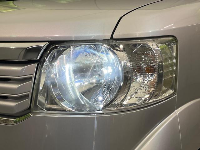 Ｎ－ＢＯＸ Ｇ・ターボＬパッケージ　４ＷＤ　ターボ　両側電動ドア　禁煙車　スマートキー　ＥＴＣ　クルコン　オートエアコン　ＣＤ　ワンセグ　ＨＩＤヘッド　パドルシフト　トラクションコントロール　ドアバイザー　革巻きステアリング（12枚目）