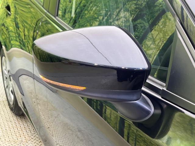 デミオ １３Ｃ　純正ナビ　衝突被害軽減システム　ブラインドスポットモニター　禁煙車　コーナーセンサー　スマートキー　ＥＴＣ　車線逸脱警報　オートライト　Ｂｌｕｅｔｏｏｔｈ　シートリフター　電動格納ドアミラー（25枚目）