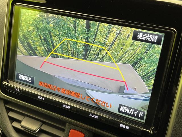 ヴォクシー Ｖ　４ＷＤ　両側電動ドア　フリップダウンモニター　純正９型ナビ　バックカメラ　衝突被害軽減システム　シートヒーター　禁煙車　前後ドラレコ　ＥＴＣ２．０　クルコン　純正１５インチＡＷ　フルセグ（6枚目）