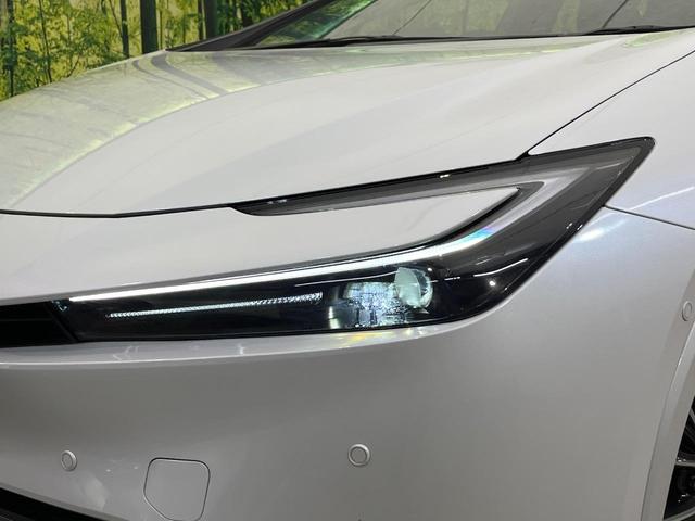 プリウス Ｚ　４ＷＤ　寒冷地仕様　純正１２．３型ディスプレイ　赤黒合皮シート　全周囲カメラ　トヨタチームメイト　１５００Ｗ電源　デジタルインナーミラー　禁煙車　電動リアゲート　シートエアコン　前後ドラレコ（13枚目）