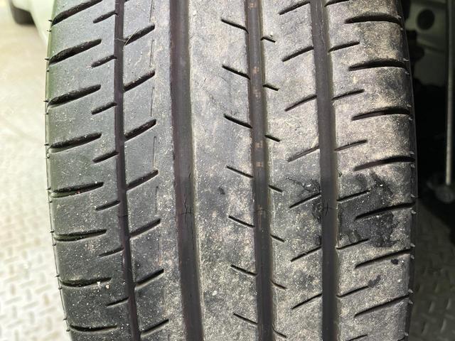 プリウス Ｚ　４ＷＤ　寒冷地仕様　純正１２．３型ディスプレイ　赤黒合皮シート　全周囲カメラ　トヨタチームメイト　１５００Ｗ電源　デジタルインナーミラー　禁煙車　電動リアゲート　シートエアコン　前後ドラレコ（23枚目）