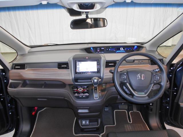 フリード Ｇ・ホンダセンシング　ホンダセンシング　メモリナビ　Ｂｌｕｅｔｏｏｔｈ　リアカメラ　両側電動スライドドア　ＬＥＤヘッドライト　センターテーブル　オートリトラミラー　Ｃパッケージ　ＥＴＣ　ＶＳＡ（12枚目）