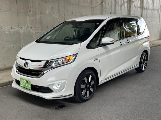 フリードハイブリッド ハイブリッド・EX ワンオーナー 両側パワスラ 純正15インチAW 純正ナビ フルセグTV バックカメラ 前後ドラレコ ETC スマートキープッシュスタート LEDヘッドライト ハーフレザーシート 禁煙車 ユーザー買取車(10枚目)