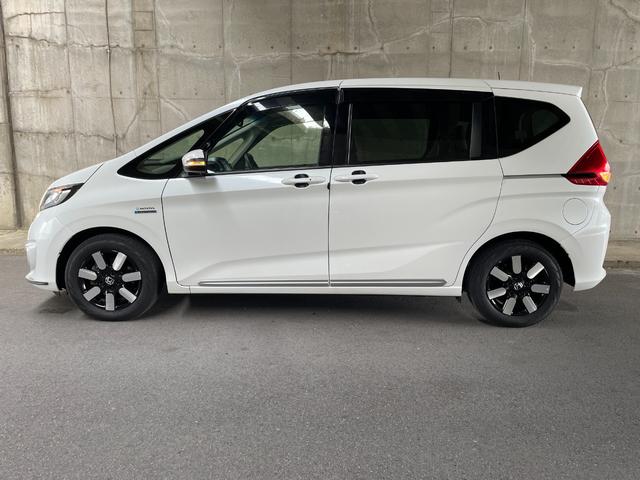 フリードハイブリッド ハイブリッド・EX ワンオーナー 両側パワスラ 純正15インチAW 純正ナビ フルセグTV バックカメラ 前後ドラレコ ETC スマートキープッシュスタート LEDヘッドライト ハーフレザーシート 禁煙車 ユーザー買取車(11枚目)