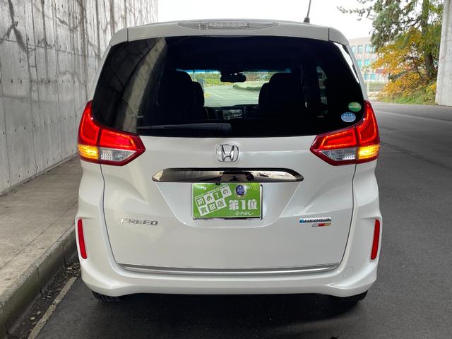 フリードハイブリッド ハイブリッド・EX ワンオーナー 両側パワスラ 純正15インチAW 純正ナビ フルセグTV バックカメラ 前後ドラレコ ETC スマートキープッシュスタート LEDヘッドライト ハーフレザーシート 禁煙車 ユーザー買取車(13枚目)