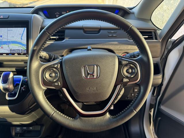 フリードハイブリッド ハイブリッド・EX ワンオーナー 両側パワスラ 純正15インチAW 純正ナビ フルセグTV バックカメラ 前後ドラレコ ETC スマートキープッシュスタート LEDヘッドライト ハーフレザーシート 禁煙車 ユーザー買取車(25枚目)