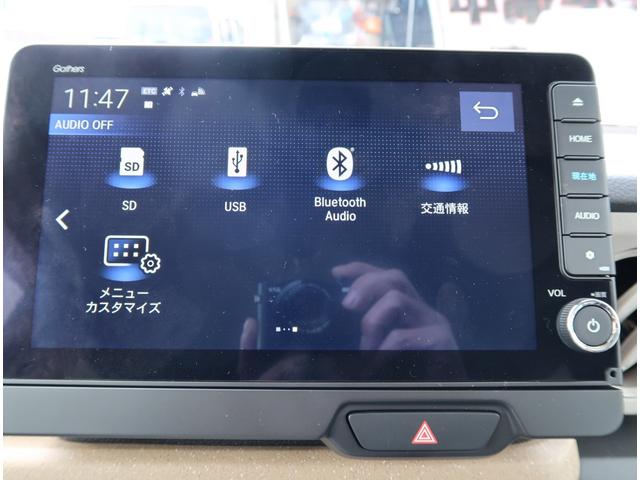 Ｎ－ＢＯＸ ファッションスタイル　４ＷＤ　届出済未使用車　９型ホンダコネクトナビ　ＴＶ　ＢＴ　ＵＳＢ　バックカメラ　ＥＴＣ２．０　両側パワースライドドア　純正マット・バイザー　前列シートヒーター　シートバックテーブル　オータムイエローパール（20枚目）