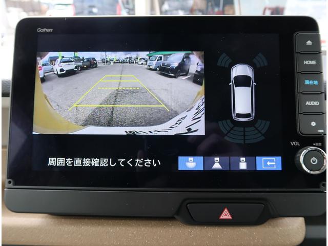 Ｎ－ＢＯＸ ファッションスタイル　４ＷＤ　届出済未使用車　９型ホンダコネクトナビ　ＴＶ　ＢＴ　ＵＳＢ　バックカメラ　ＥＴＣ２．０　両側パワースライドドア　純正マット・バイザー　前列シートヒーター　シートバックテーブル　オータムイエローパール（21枚目）