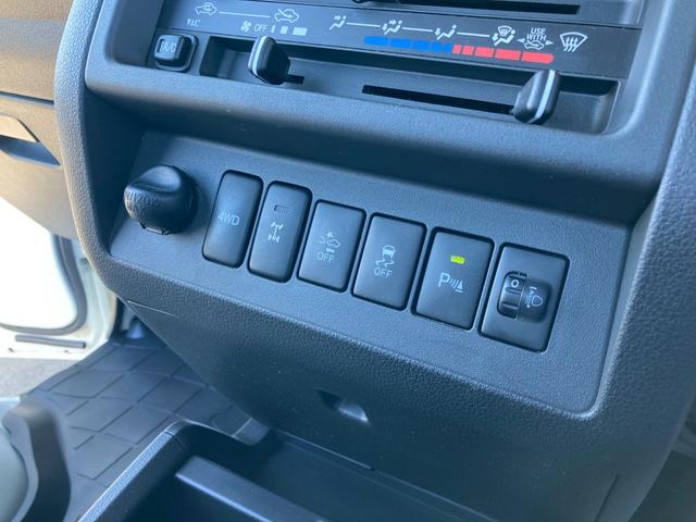サンバートラック TBスマートアシスト 4WD 長野県限定車 5M/T リヤデフロック LEDヘッドランプ/フォグランプ メッキミラーカバー 4枚リーフスプリング SAIIIt クリアランスソナー ETC ナビ TV オートライト ABS ESC CD USB(27枚目)