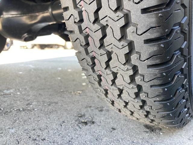 サンバートラック TBスマートアシスト 4WD 長野県限定車 5M/T リヤデフロック LEDヘッドランプ/フォグランプ メッキミラーカバー 4枚リーフスプリング SAIIIt クリアランスソナー ETC ナビ TV オートライト ABS ESC CD USB(45枚目)