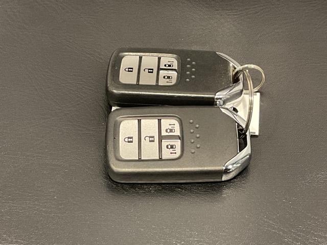 ステップワゴンスパーダ スパーダホンダセンシング 盗難防止 助手席エアバッグ Wパワスラ 地デジ LEDライト 横滑り防止システム オートエアコン リアカメラ ドライブレコーダー装着車 ナビ&TV 三列シート ETC付(37枚目)