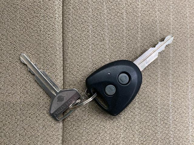 ムーヴ L SA 4WD CDプレイヤー AUX接続 キーレス アイドリングストップ 衝突軽減ブレーキ 社外14インチアルミホイール 盗難防止装置 エアコン パワーウィンドウ 電動格納ドアミラー(21枚目)