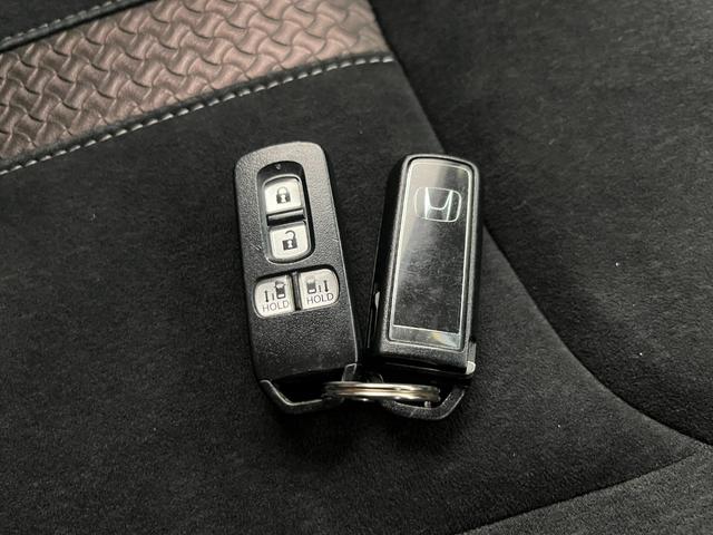 Ｎ－ＢＯＸカスタム Ｇ・ＥＸホンダセンシング　４ＷＤ　両電スラ　バックモニター　ＥＴＣ　クルコン　純正メモリナビ　Ｂｌｕｅｔｏｏｔｈ　ＵＳＢ　ＣＤ　ＤＶＤ　フルセグＴＶ　シートヒーター　フルフラット　スマートキー　オートＬＥＤ（24枚目）