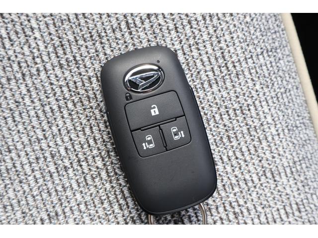ムーヴキャンバス ストライプスＧ　届出済未使用車　４ＷＤ　バックカメラ　両側電動スライドドア　ナビ　ＴＶ　クリアランスソナー　衝突被害軽減システム　オートライト　ＬＥＤヘッドランプ　スマートキー　アイドリングストップ　電動格納ミラー（11枚目）
