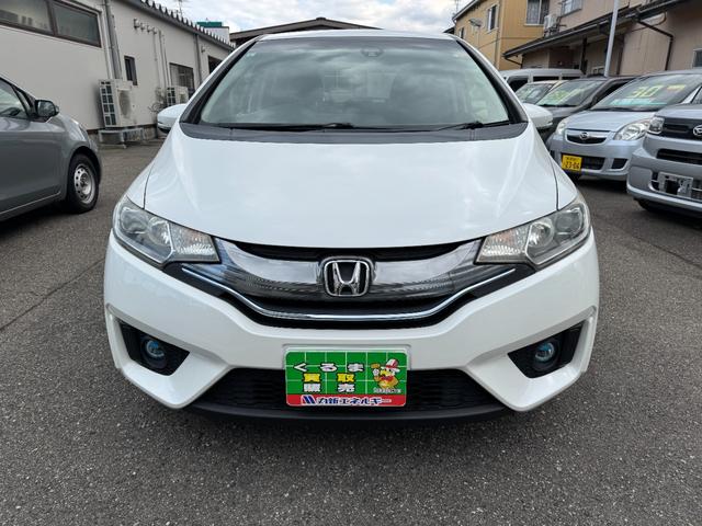 フィットハイブリッド Lパッケージ Lパッケージ Bluetooth ナビ フルセグ バックカメラ DVD再生 ハーフレザーシート ETC スマートキー LEDヘッドライト 点検整備記録簿 ホンダセンシング(2枚目)