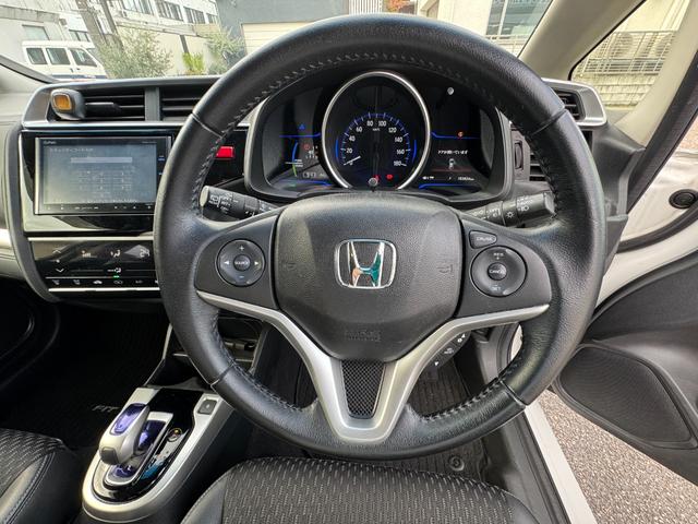 フィットハイブリッド Lパッケージ Lパッケージ Bluetooth ナビ フルセグ バックカメラ DVD再生 ハーフレザーシート ETC スマートキー LEDヘッドライト 点検整備記録簿 ホンダセンシング(8枚目)