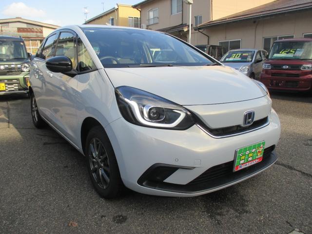 フィット e:HEVホーム 20周年特別仕様車 メゾン 4WD 特別仕様車メゾン ホンダセンシング 純正ナビ フルセグTV DVD CD Bluetooth 前後ドラレコ LED ETC 純正16アルミ スタッドレス有 ワンオーナー 記録簿 取説 保証書(2枚目)