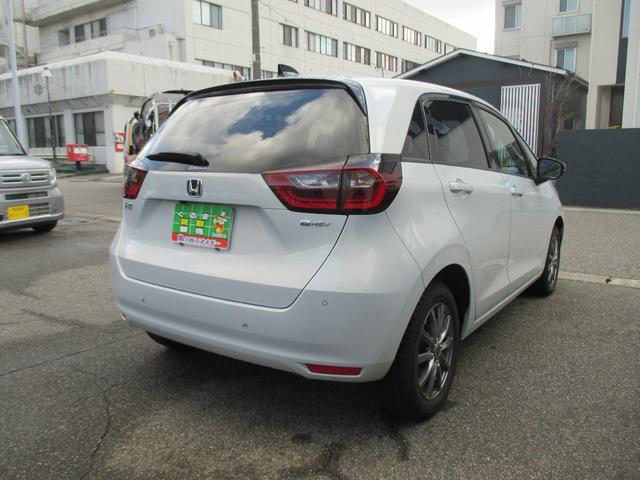 フィット e:HEVホーム 20周年特別仕様車 メゾン 4WD 特別仕様車メゾン ホンダセンシング 純正ナビ フルセグTV DVD CD Bluetooth 前後ドラレコ LED ETC 純正16アルミ スタッドレス有 ワンオーナー 記録簿 取説 保証書(5枚目)