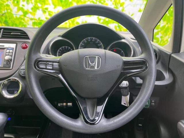 フィットシャトル １５Ｘ　純正　ＳＤナビ／シート　ハーフレザー／ヘッドランプ　ＨＩＤ／ＥＴＣ／ＡＢＳ／横滑り防止装置／ワンセグＴＶ／ＤＶＤ／エアバッグ　運転席／エアバッグ　助手席／エアバッグ　サイド　ＤＶＤ再生（13枚目）