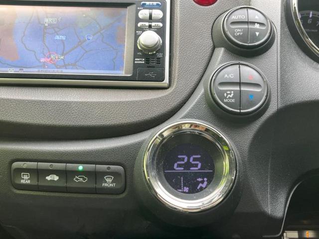 フィットシャトル １５Ｘ　純正　ＳＤナビ／シート　ハーフレザー／ヘッドランプ　ＨＩＤ／ＥＴＣ／ＡＢＳ／横滑り防止装置／ワンセグＴＶ／ＤＶＤ／エアバッグ　運転席／エアバッグ　助手席／エアバッグ　サイド　ＤＶＤ再生（26枚目）
