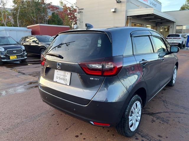 フィット e:HEVホーム リヤカメラ DVD再生可能 VSA サイドカーテンエアバック 前後ソナー スマートキ 踏み間違い防止 盗難防止装置 クルコン ETC車載器 パワーウィンドウ LEDヘッドライト(7枚目)