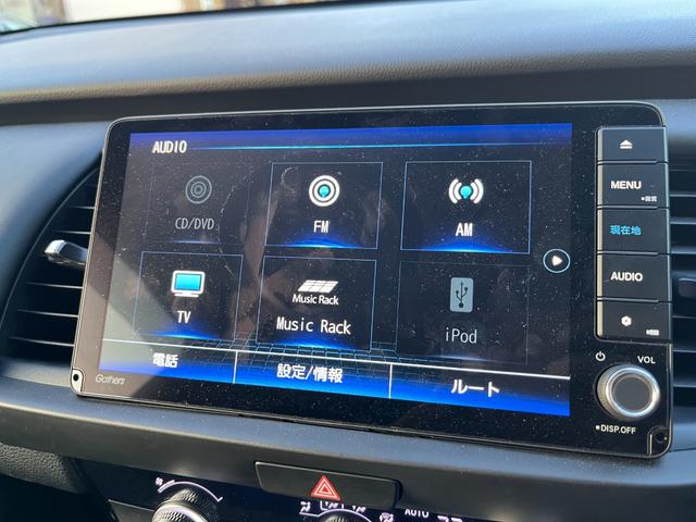 フィット e:HEVホーム リヤカメラ DVD再生可能 VSA サイドカーテンエアバック 前後ソナー スマートキ 踏み間違い防止 盗難防止装置 クルコン ETC車載器 パワーウィンドウ LEDヘッドライト(25枚目)