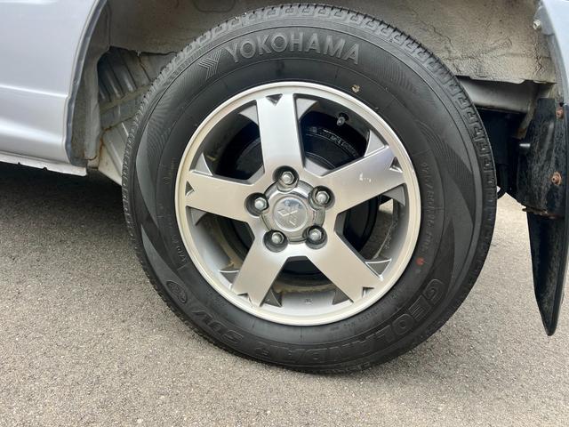 パジェロミニ VR 禁煙車 切り替え式4WD エアコン 純正オーディオ電動格納ミラー キーレス 盗難防止装置 プライバシーガラス 純正15インチアルミホイール インタークーラーターボ(31枚目)