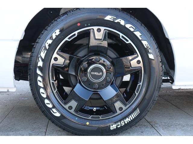 ハイエースワゴン GL 2700ガソリン4WD パールホワイト オリジナルフロントスポイラー ゼロベッド カロッツェリアナビ フリップダウン ETC デジタルインナーミラー ナスカータイヤ ローダウン 17インチアルミ(33枚目)