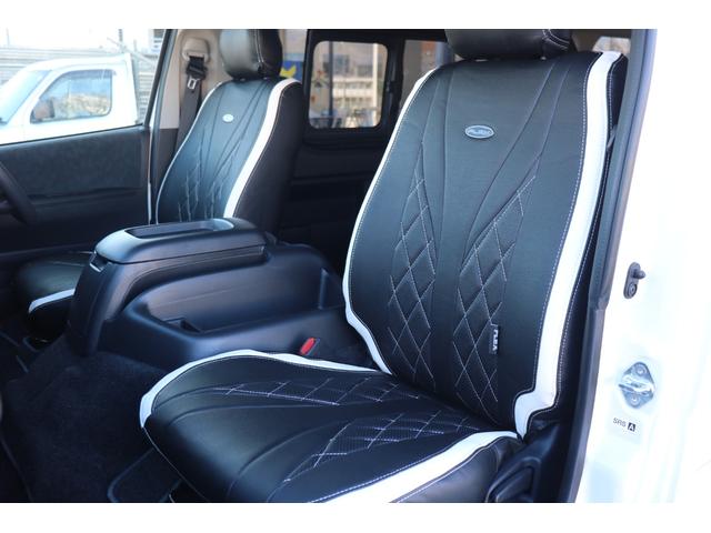 ハイエースワゴン グランドキャビン ファインテックツアラー ファインテックツアラーフローリング床張り施工BIG-XナビフリップダウンETC2.0スマートベッドフロントスポイラーオーバーフェンダーDELF02 18インチアルミアルティメットテールローダウン(32枚目)