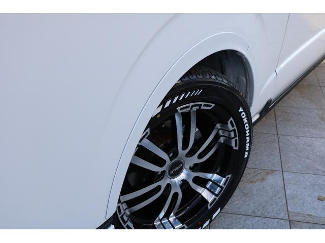 ハイエースワゴン グランドキャビン ファインテックツアラー ファインテックツアラーフローリング床張り施工BIG-XナビフリップダウンETC2.0スマートベッドフロントスポイラーオーバーフェンダーDELF02 18インチアルミアルティメットテールローダウン(38枚目)
