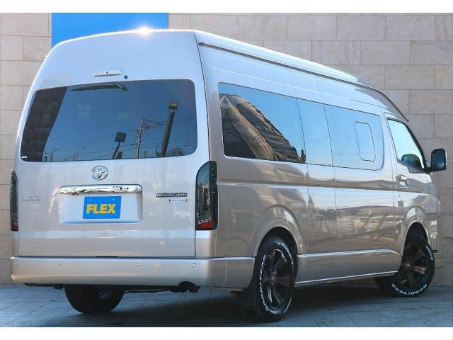 ハイエースワゴン グランドキャビン ファインテックツアラー ベージュ ファインテックツアラー キャプテンシート4脚 オリジナルフロントスポイラー ローダウン BIGXナビ フリップダウン ETC シートカバー ベットキット バルベロ17インチ ナスカータイヤ(3枚目)